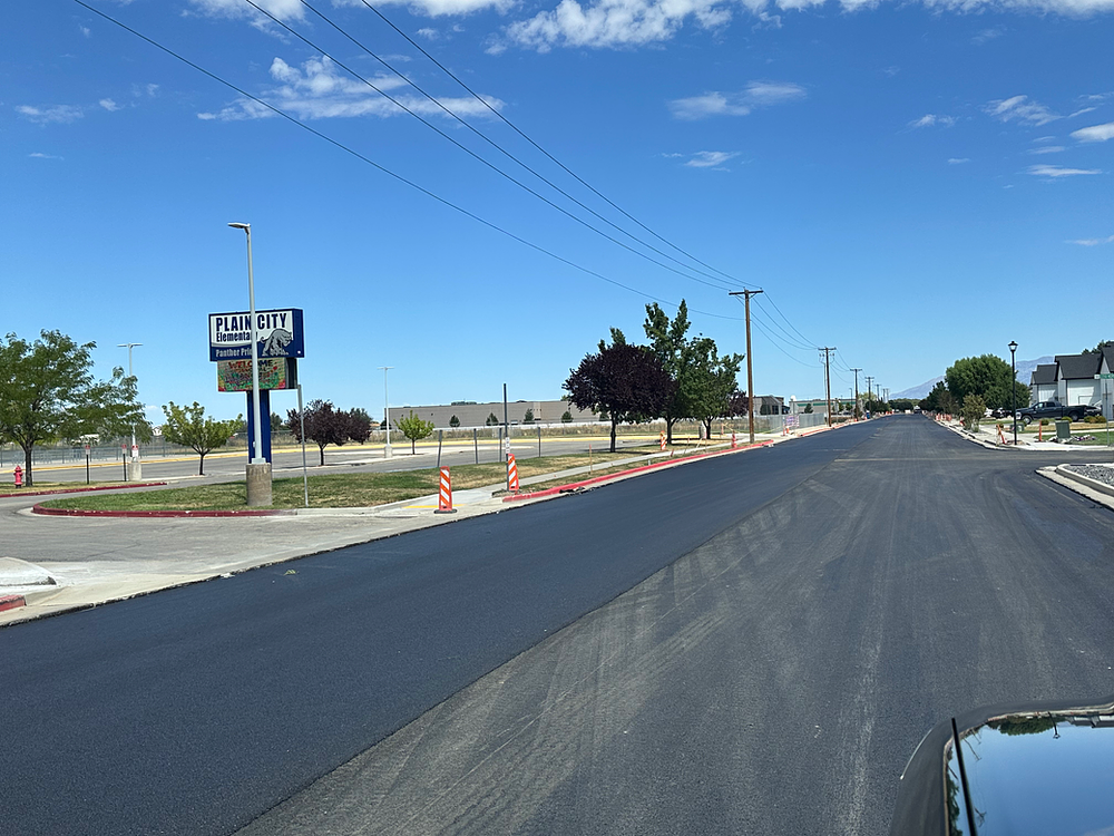 New asphalt on the road, first phase of paving — 8/14/26